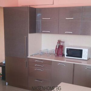 Корал - модерна кухня в кафяво с технически камък